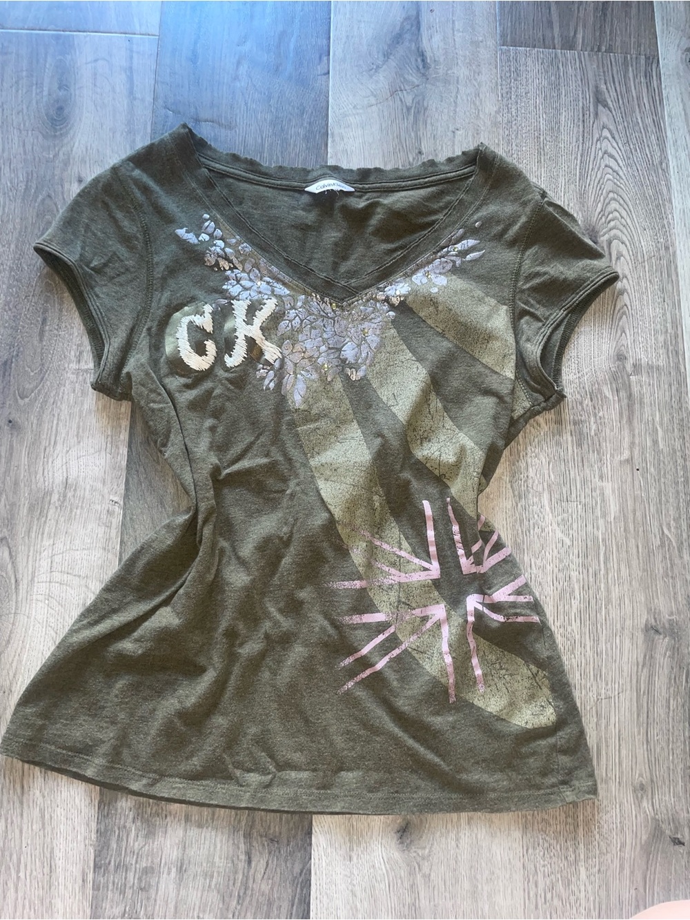 Calvin Klein Olive Green V‑Neck Tee with Floral & Metallic Accents